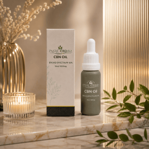 Premium lifestyle image of Pure CBD4U CBN Oil Broad Spectrum 10% (10ml / 1000mg) with elegant candlelight and botanical elements in a luxurious calming setting.