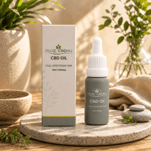 Premium lifestyle image of Pure CBD4U Full Spectrum CBD Oil 10% (10ml / 1000mg) in an elegant natural setting with soft light and botanical elements.